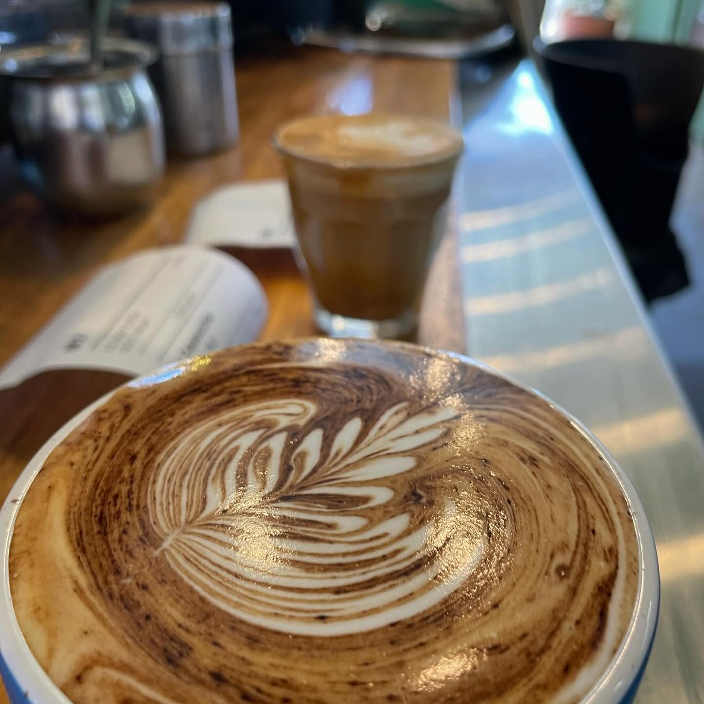 Latte art on a Fala Fels coffee at the bar